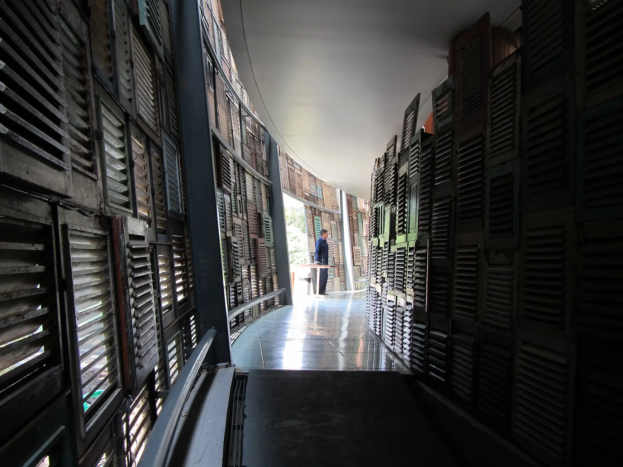 Corridor lined with timber shutters