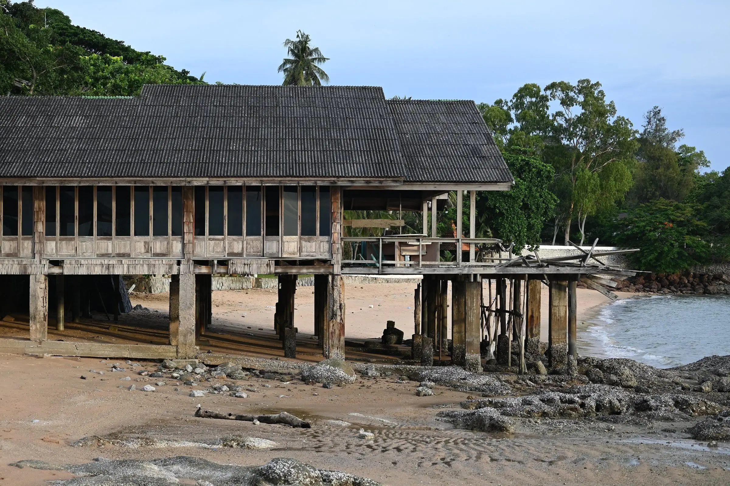 Weathered timber house raised on stilts